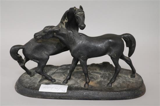 A Russian cast iron equine group height 16cm width 24cm